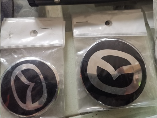 [EMBL46001C] EMBLEMA CENTRO RIN MAZDA CHICOS